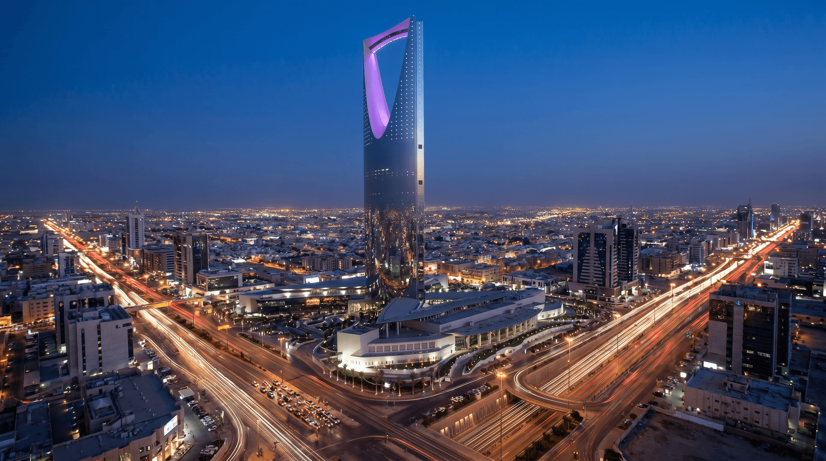 Riyadh skyline at dusk with the Kingdom Centre, Saudi Arabia